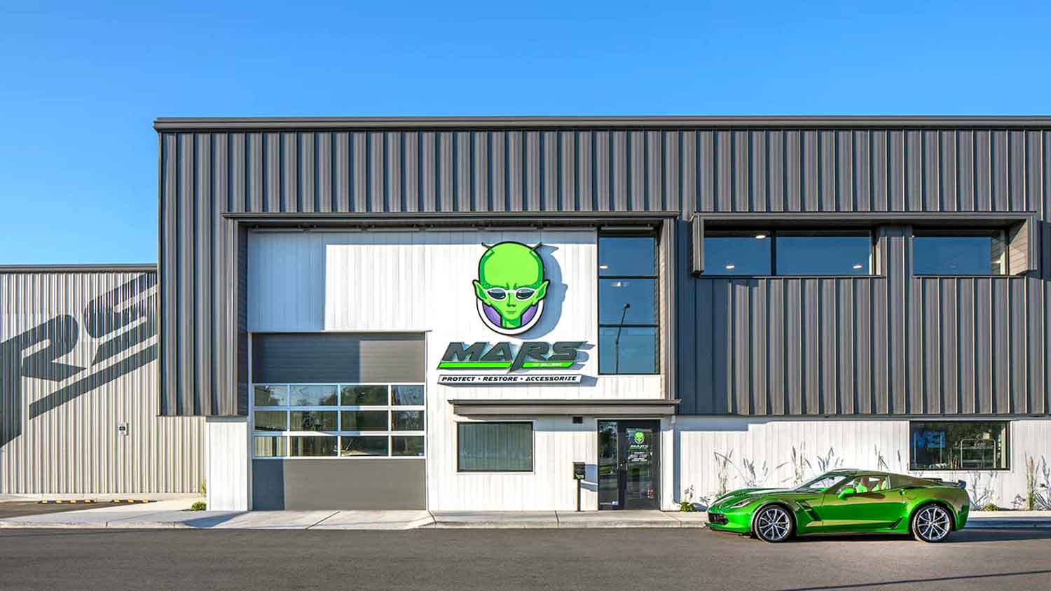 MARS of Billings center building exterior with green sports car parked