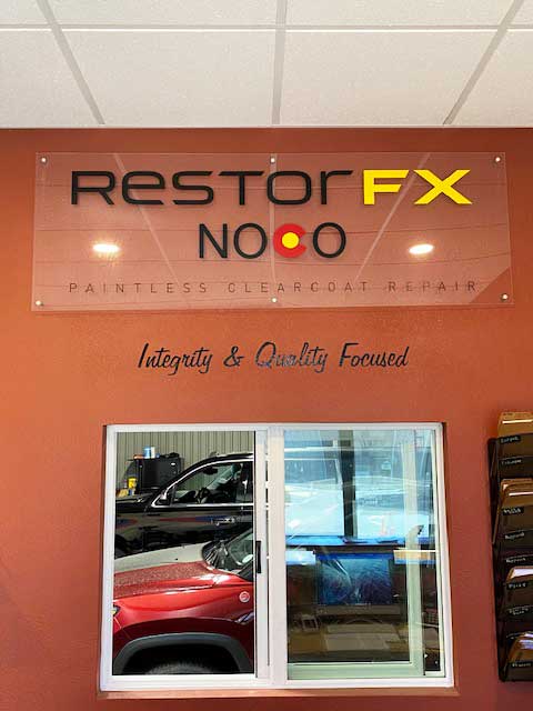 RestorFX NOCO check-in window pointing into the shop area lined up with cars