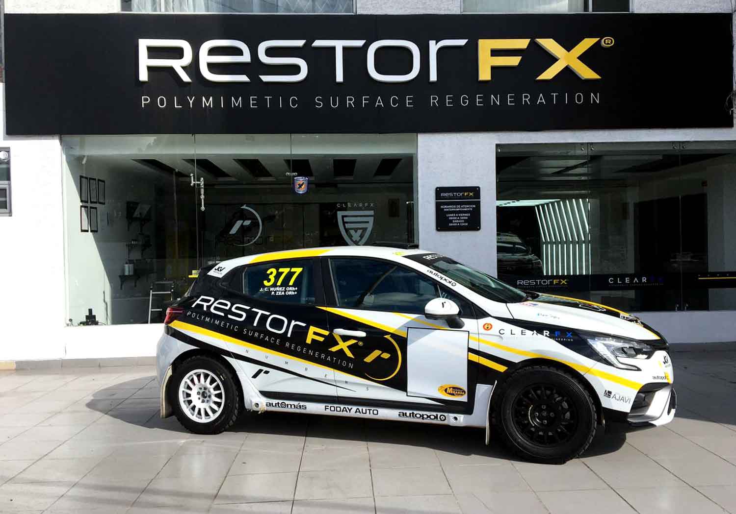 RestorFX branded car parked in from of the RestorFX Ambato storefront