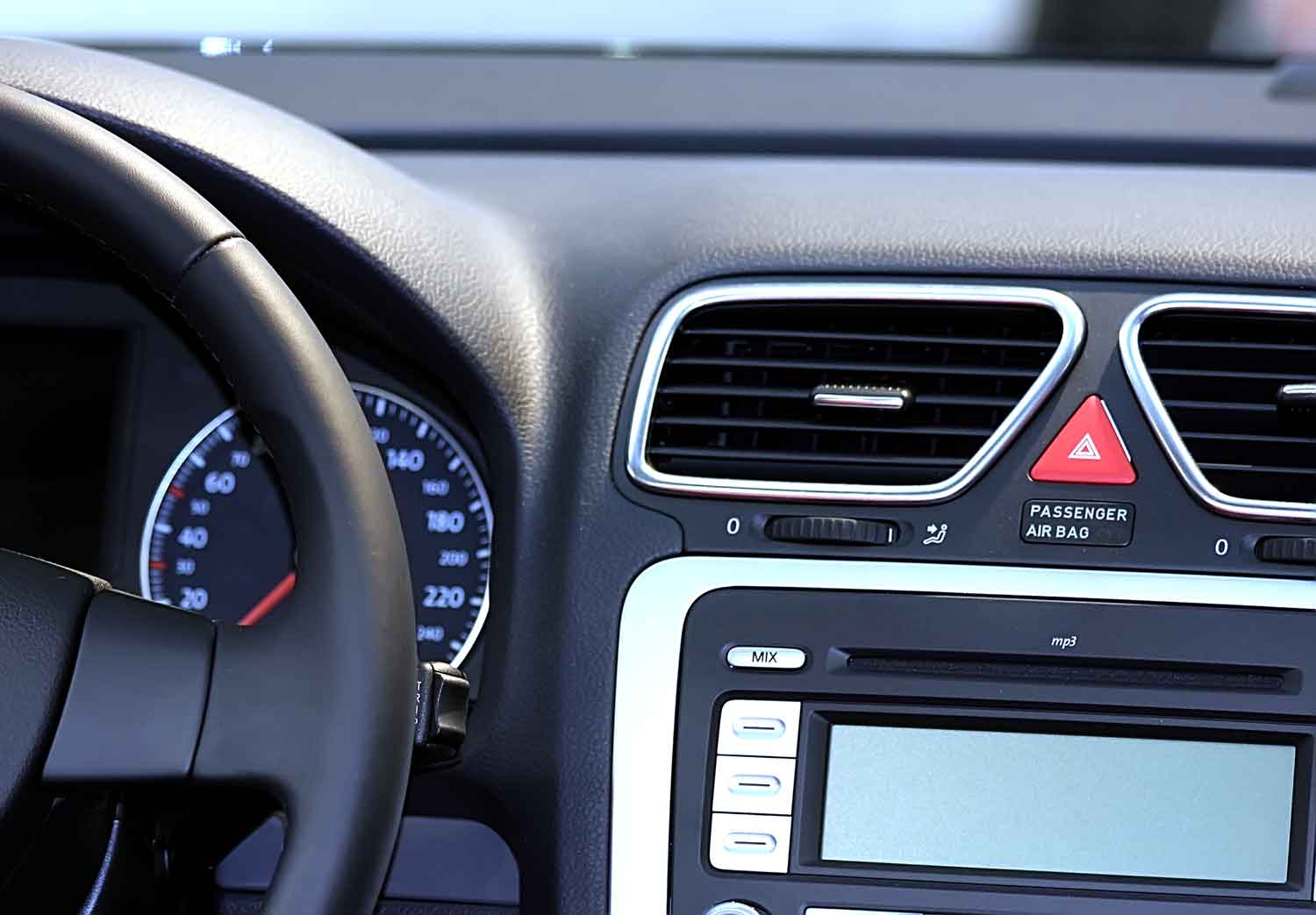 Black dashboard and a black steering wheel